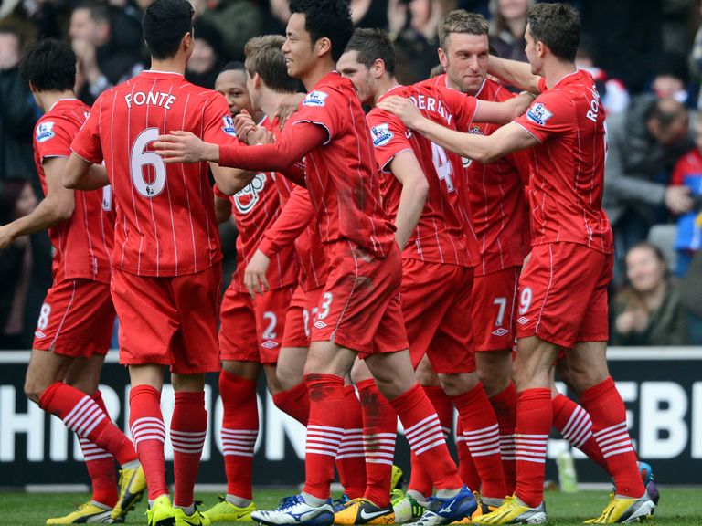 Lambert: Celebrates with team-mates