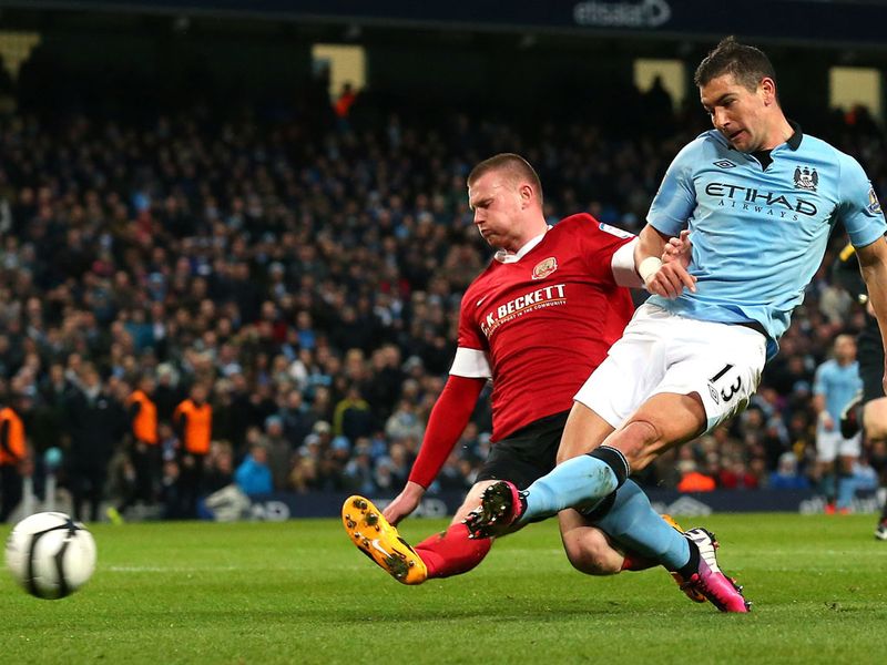 Aleksandar Kolarov doubles City's advantage