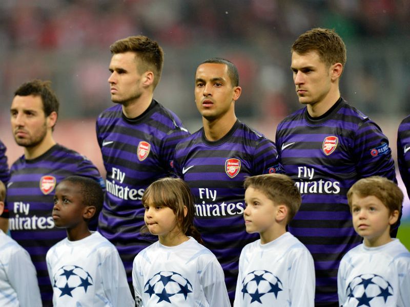 Arsenal's players line up before kick-off against Bayern Munich in the Champions League