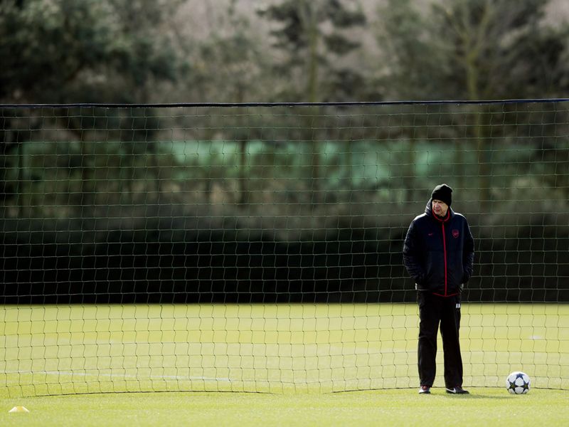 Wenger faces the cold snap as Arsenal complete a training session at London Colney before flying to Munich.