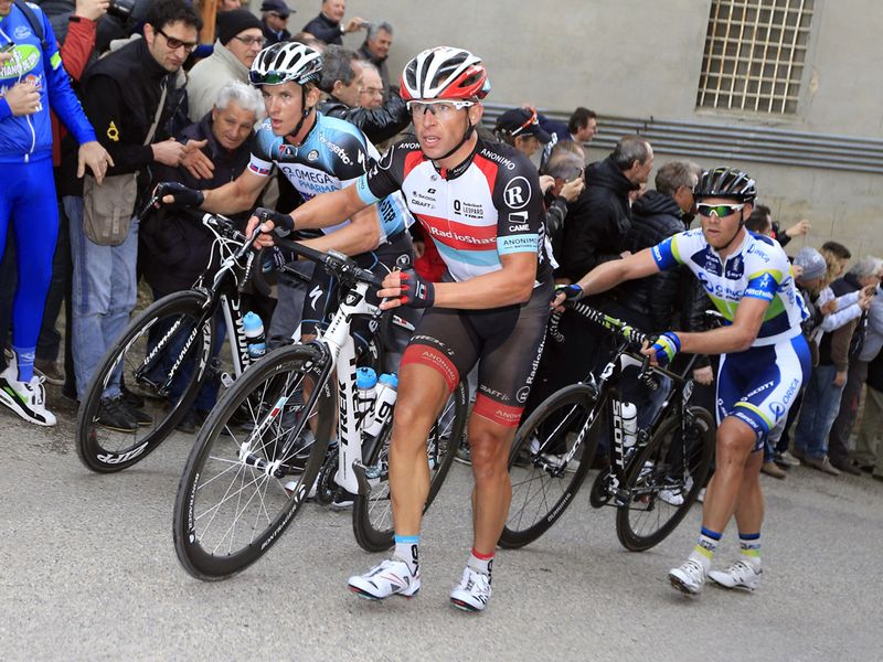 The combination of 27% gradient and wet roads meant some riders, including Stijn Devolder, had to walk it