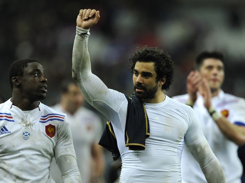 Raised fist: France's full back Yoann Huget celebrates his team's 23-16 victory