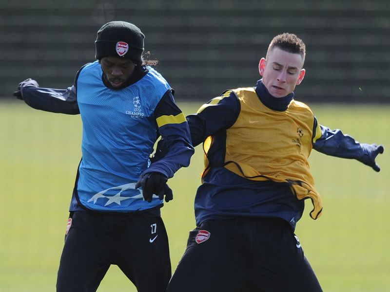 Gervinho and Laurent Koscielny in action.