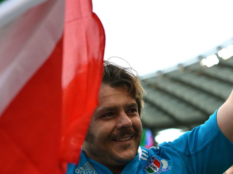 Winning feeling: Andrea Lo Cicero salutes the crowd after his final game for Italy ends in victory