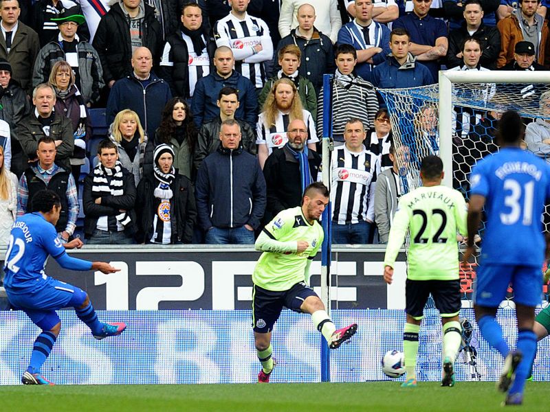 Wigan's Jean Beausejour scores his side's opening goal of the game against Newcastle