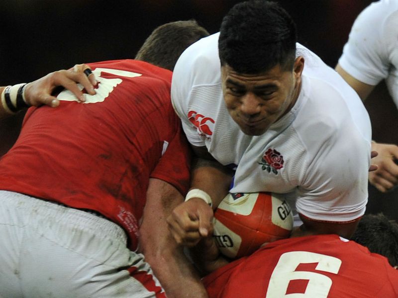 Dead end: Manu Tuilagi is unable to get through Ian Evans and Sam Warburton