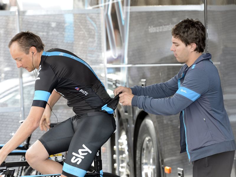 Carer Marko Dzalo helps Danny Pate make his final preparations before the off
