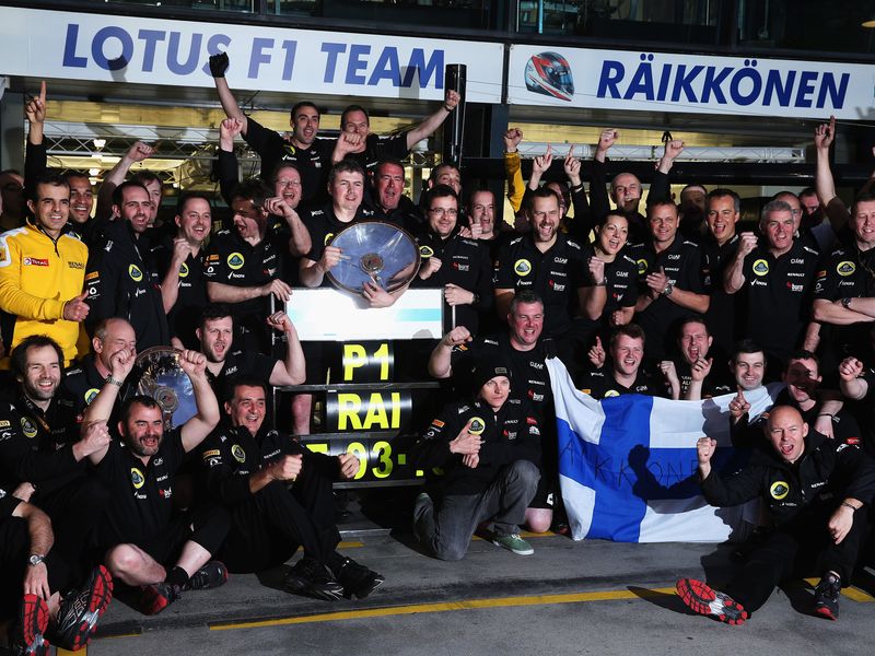 Kimi Raikkonen  and Lotus celebrate