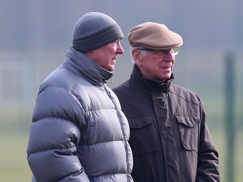 Sir Bobby Charlton joins Sir Alex at the Carrington training complex on Monday morning.