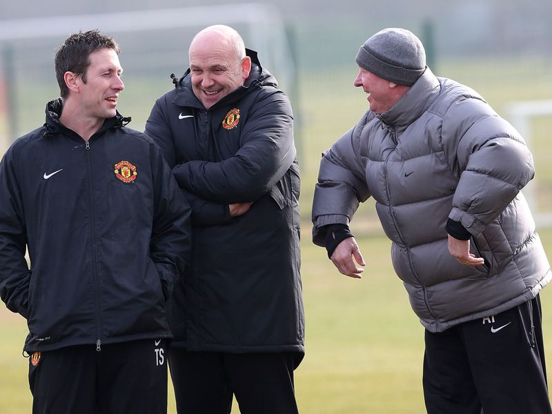 The mood between Tony Strudwick, Mike Phelan and Sir Alex Ferguson seems relaxed..
