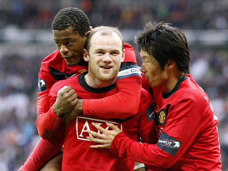 Rooney bags 33 goals in all competitions in the 2009/10 season and picks up the PFA and Football Writers' Player of the Year awards.