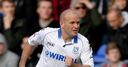 Robinson stays with Rovers