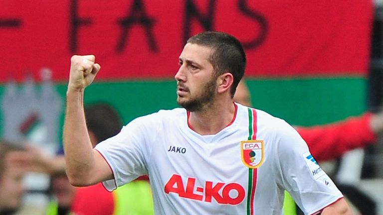 Sascha Moelders celebrates his goal for Augsburg