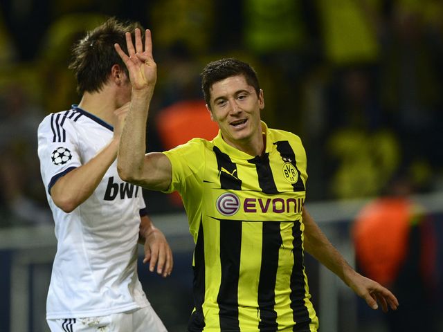 Robert Lewandowski celebrates his fourth goal for Dortmund