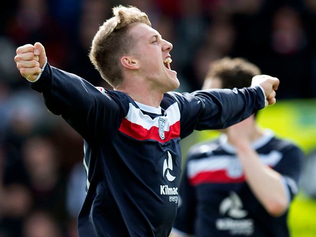 Jim McAlister celebrates his goal for Dundee