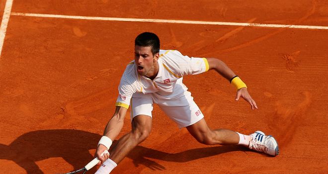 Novak Djokovic: Serb digs out a forehand during third-round win in Monte Carlo