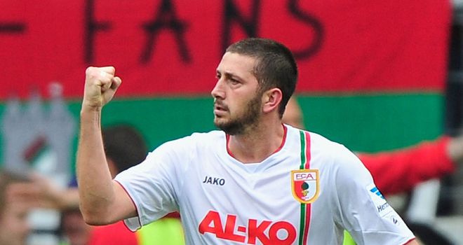 Sascha Moelders celebrates his goal for Augsburg