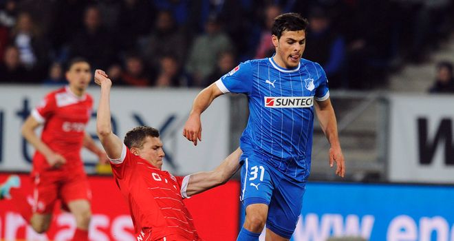 Oliver Fink tries to stop Kevin Volland.