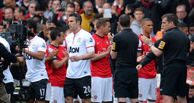Guard of honour: United and Van Persie received a much-talked about welcome to the pitch