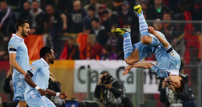 Hernanes celebrates after giving Lazio the lead