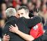 Sir Alex Ferguson and Robin van Persie share an embrace