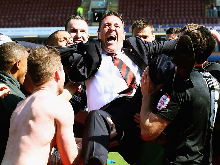 Malky Mackay leads the celebrations for Cardiff