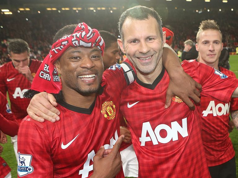 Giggs: Celebrates winning his 13th title with Evra