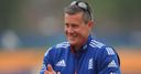 Giles happy to aim high