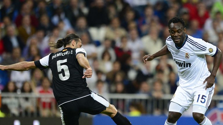 Michael Essien vies with Martin Demichelis.