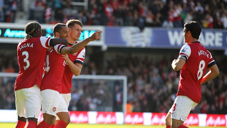 Theo Walcott: Celebrates Arsenal's very early winner