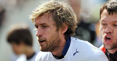 Ex-Wales star Robinson retires