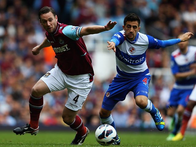 Kevin Nolan and Jem Karacan tangle