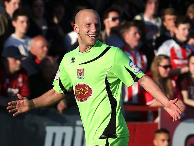 Luke Guttridge: Celebrates his stunning strike
