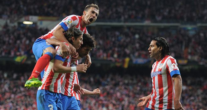 Gabi (l), Felipe Luis (number three) and Radamel Falcao (r): Celebrate Atletico Madrid's first goal against Real Madrid