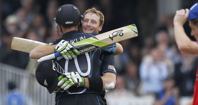 Guptill and James Franklin celebrate New Zealand's victory