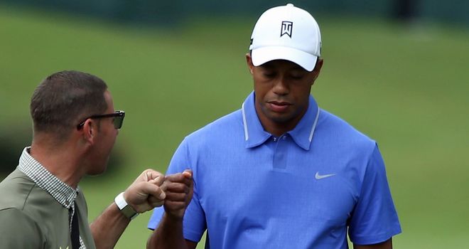 Tiger Woods (with coach Sean Foley in practice) has struggled at Sawgrass