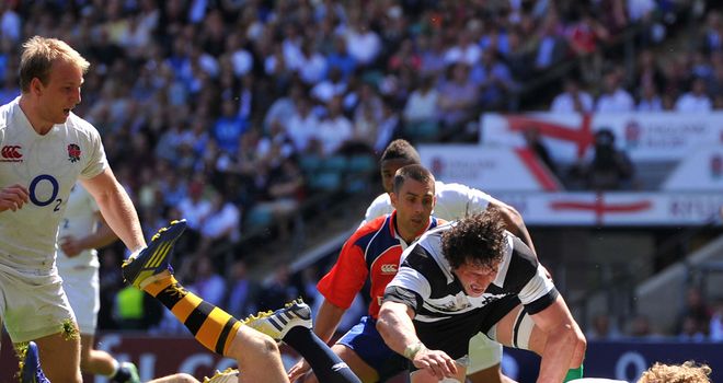 Billy Twelvetrees crashes over for England's fifth try
