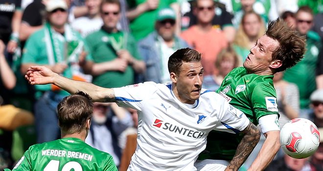 Clemens Fritz collides with Fabian Johnson