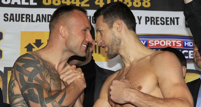 Mikkel Kessler and Carl Froch exchange words at the weigh-in (Pic Lawrence Lustig)