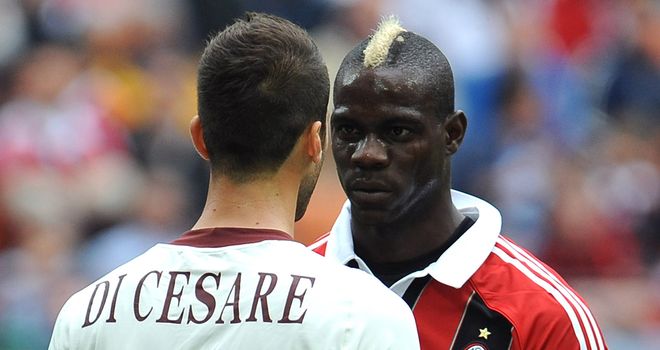 Valerio Di Cesare and Mario Balotelli confront each other