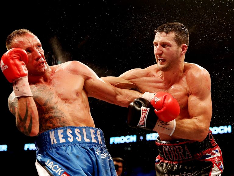 Kessler (l) and Froch during last year's rematch at the O2