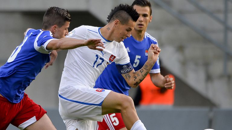 Marek Hamsik battles his way forward