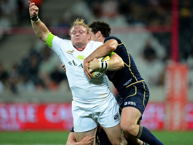 South Africa's Adriaan Strauss is tackled