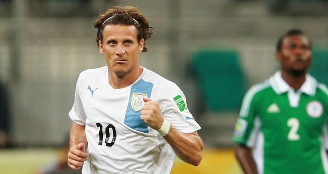 Diego Forlan: Celebrates his decisive goal