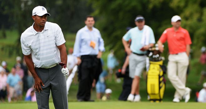 Tiger Woods and Sergio Garcia on the practice range at Merion