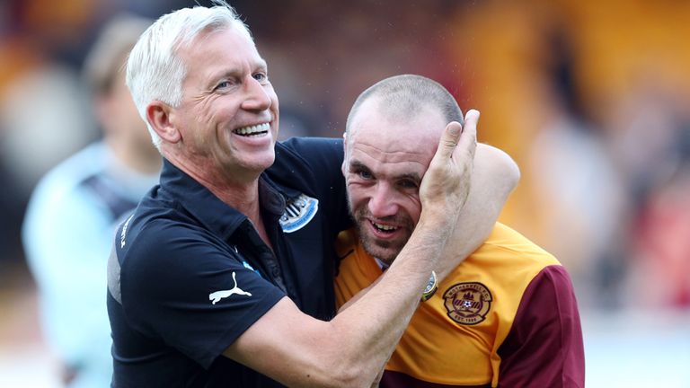 Newcastle boss Alan Pardew shares a joke with James McFadden after the final whistle