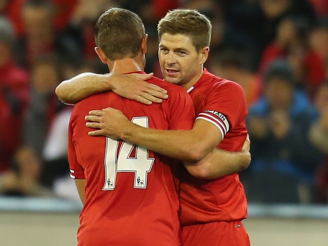 Steven Gerrard: Celebrates Liverpool's opener with Jordan Henderson