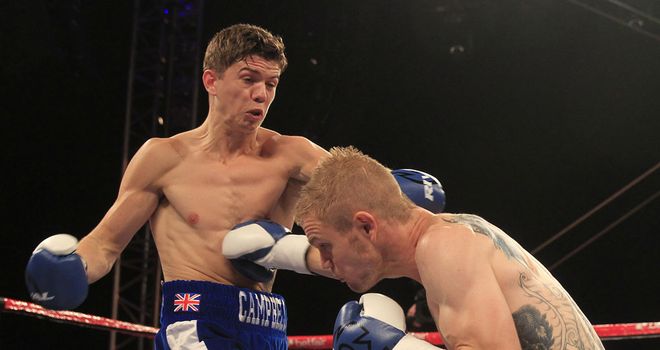 Luke Campbell (L) lets the right hand go as Harris looks to land a shot (Pic Lawrence Lustig)