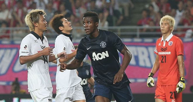 Wilfried Zaha: Celebrates after earning United a late draw
