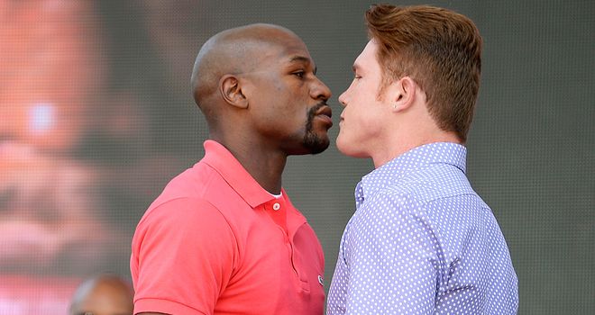 Close call: Glenn thinks Mayweather (L) will maintain his unbeaten record - just